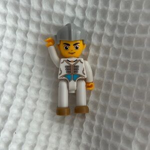 White and Gray Toy Figure